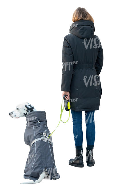 woman with a dalmatian dog standing