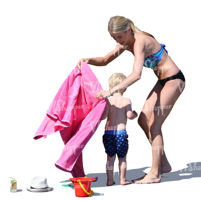 mother drying her son on the beach
