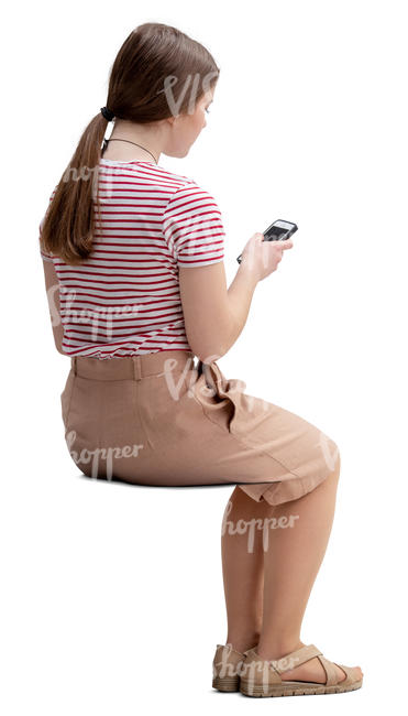 young woman with a phone sitting