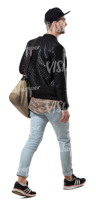 young man walking and smiling