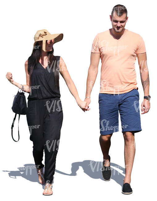 couple walking and holding hands in the summer