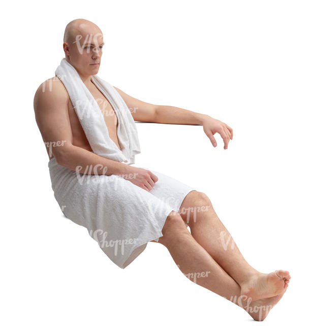 man sitting in the sauna