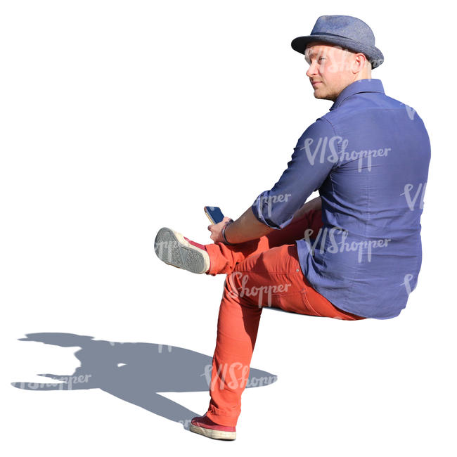 man sitting with legs crossed