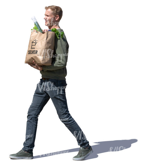 man with a grocery bag walking