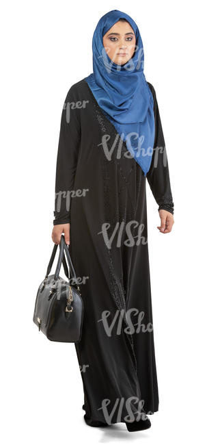 muslim woman with blue hijab walking