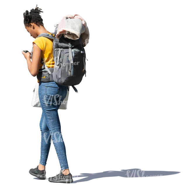 woman with a hiking bag walking