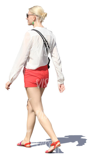 woman in red shorts walking