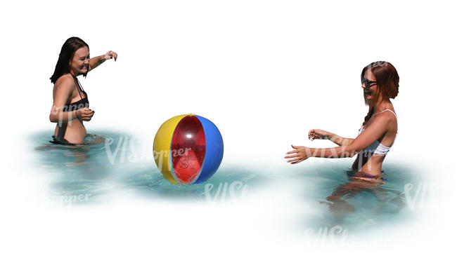 two women playing beach ball in the pool