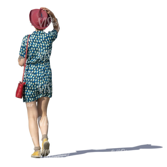 woman with a red hat walking