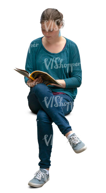 woman sitting and reading a magazine