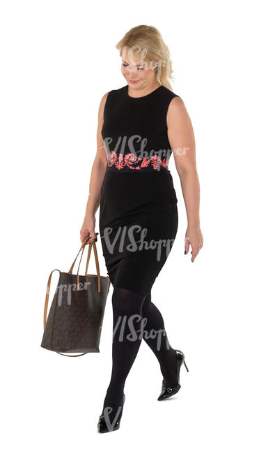 woman in a black dress walking