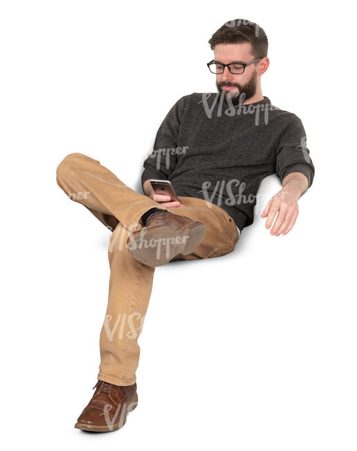 man sitting and texting