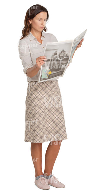 woman standing and reading a newspaper