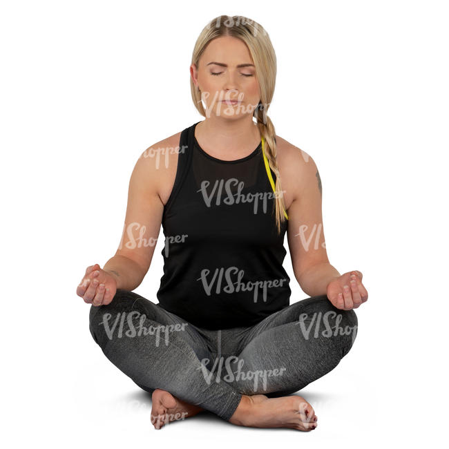woman sitting and meditating