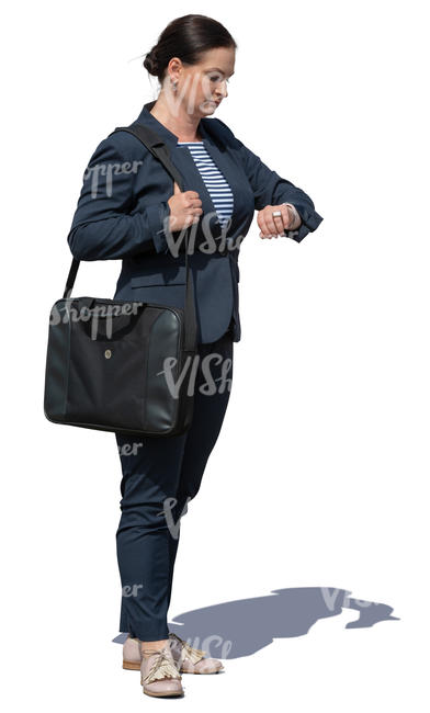 businesswoman standing and checking her watch