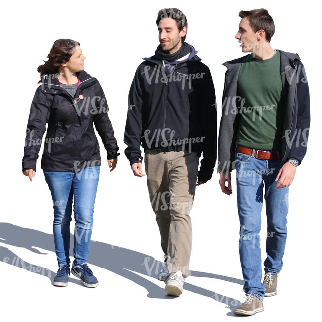 group of three people walking and talking