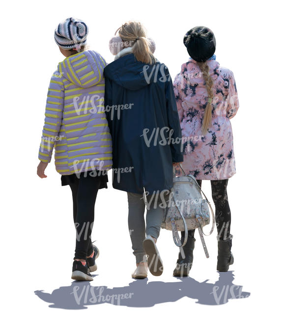 three backlit girls walking