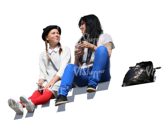 woman and girl sitting on the stairs and talking