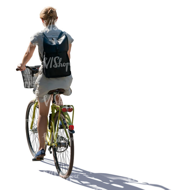 backlit woman riding a bicycle