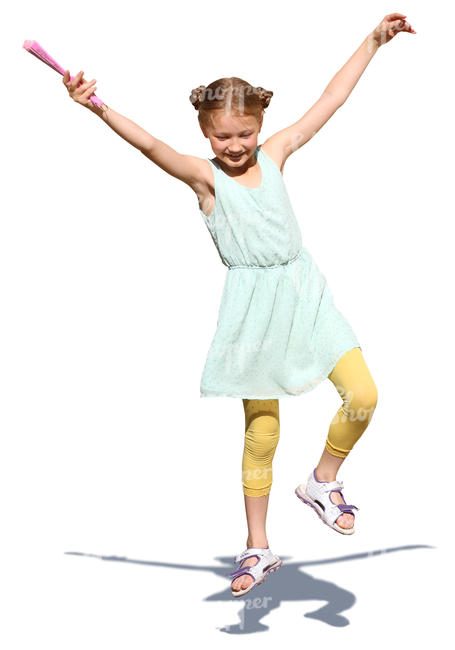 young girl in a summer dress jumping in the air
