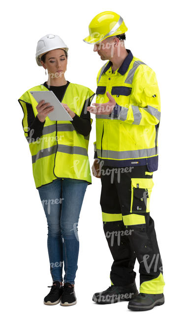 man and woman talking at a construction site