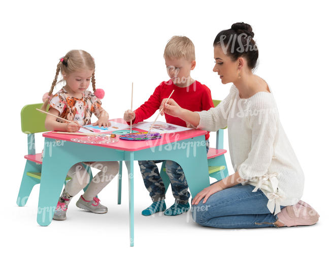 children painting at childrens play table