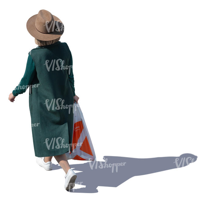 woman with a hat and overcoat walking seen from above