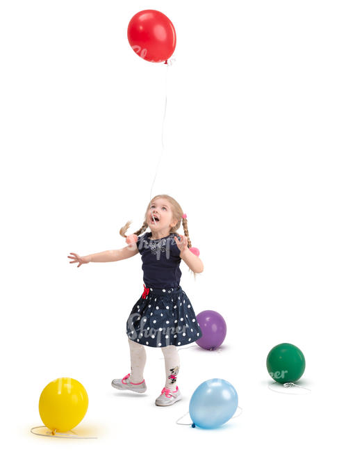 little girl playing with balloons