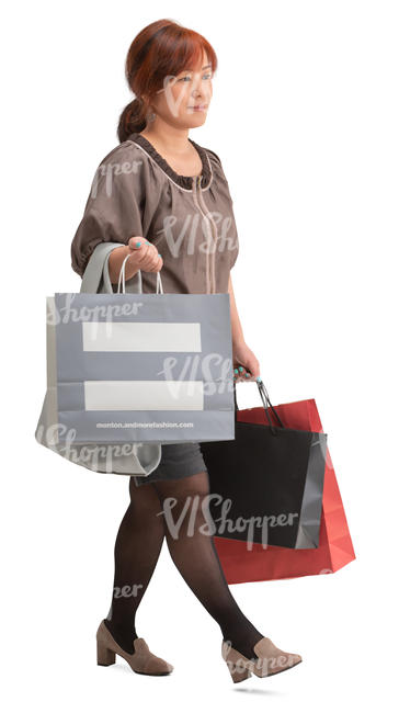asian woman with shopping bags walking