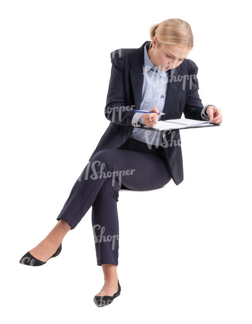 businesswoman sitting and writing notes