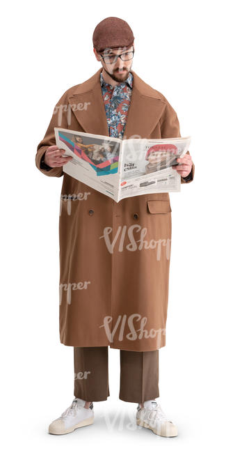 man in a brown overcoat standing and reading a newspaper