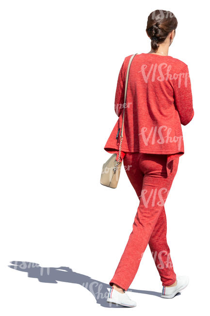 woman in a red outfit walking