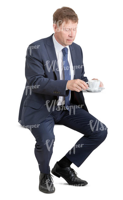 businessman sitting and drinking coffee