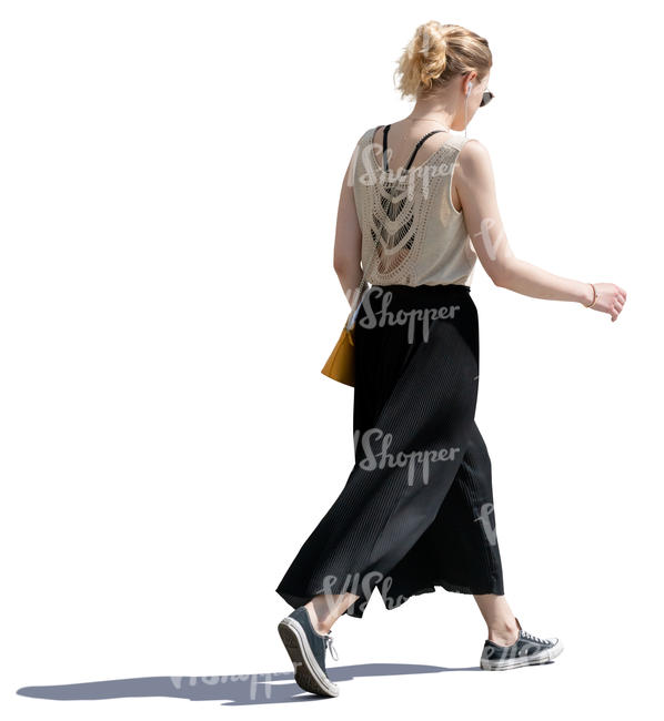 woman in a black skirt walking