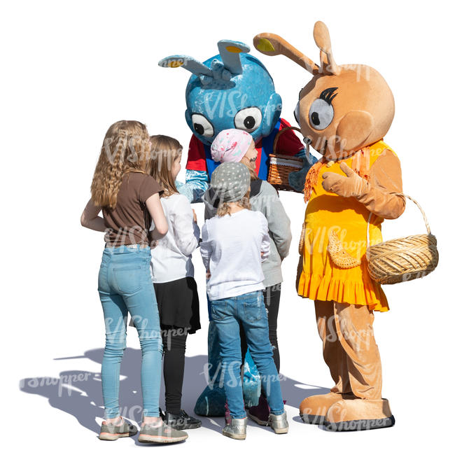 children talking with two big rabbits