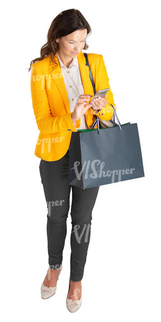 bird eye view of a woman with a shopping bag standing