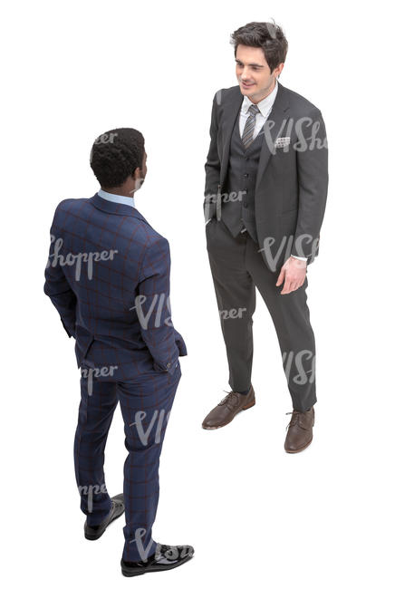 two men in suits talking seen from above