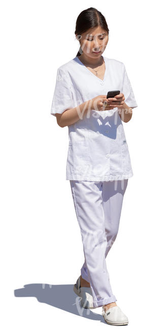 young asian doctor walking