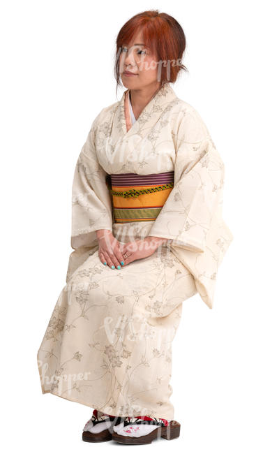 japanese woman in a kimono sitting