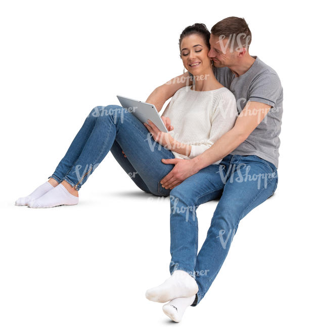 couple sitting and watching videos together