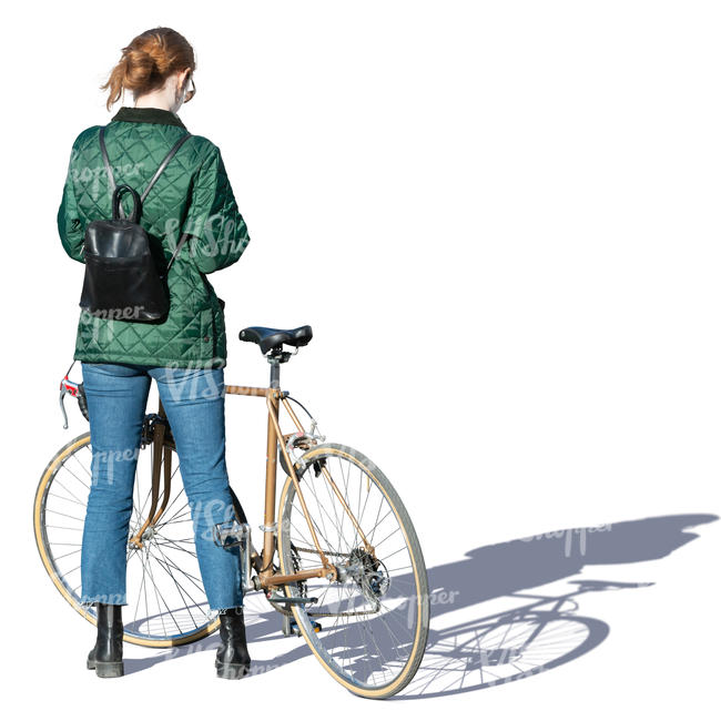 woman with a bicycle standing and texting