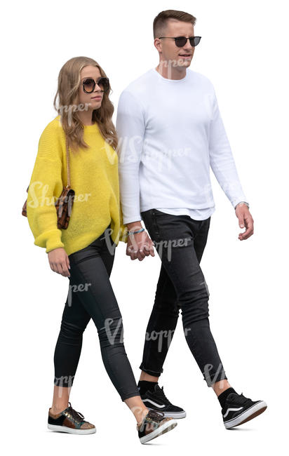 man and woman walking hand in hand