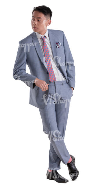 asian man in a grey suit standing