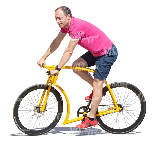 man riding a yellow bike