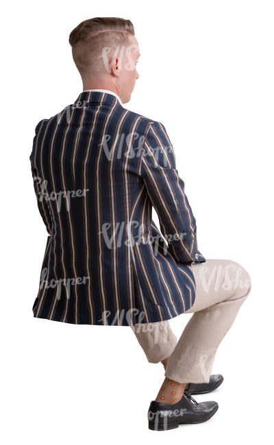 man in a striped jacket sitting