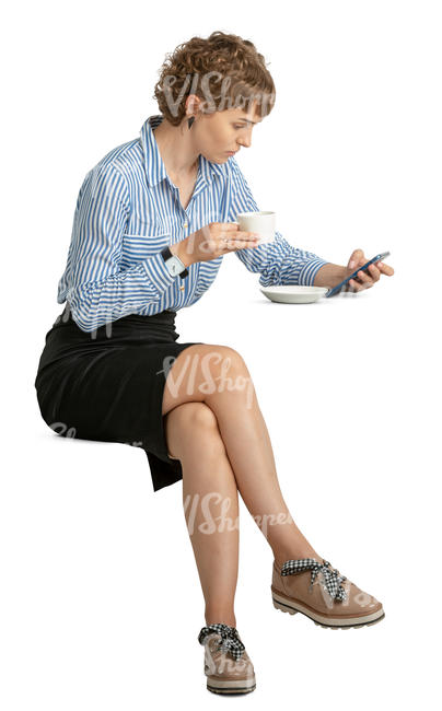 woman drinking coffee and texting