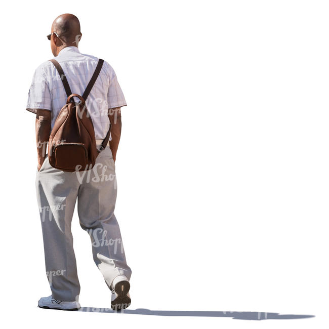 backlit older man walking