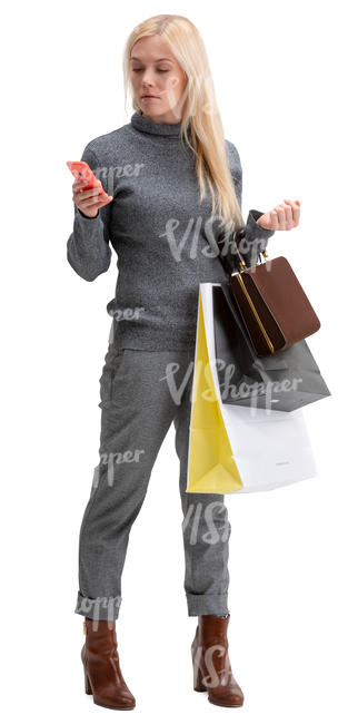 woman with many shopping bags standing