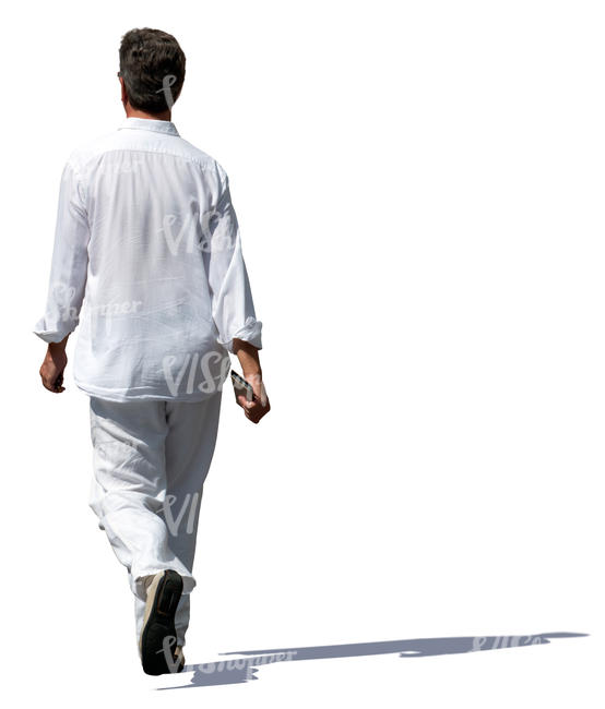 man in a white outfit walking