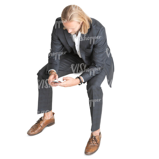 young businessman sitting seen from above